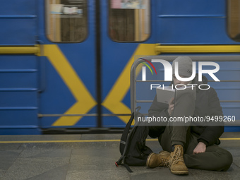 Man use a subway station  as a bomb shelter during massive Russian missile attack in Kyiv, Ukraine January 26, 2023 (