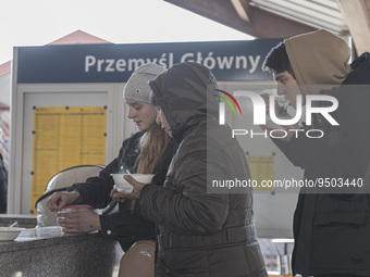 War refugees from Ukraine arrive at Przemysl railway station and get warm food. Civilians mostly women, old people and children who fled the...