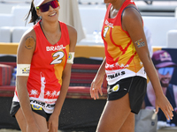  Eduarda Santos Lisboa (L) and Ana Patricia Silva Ramos (R) of Brazil  action during the women's Volleyball World Beach Pro Tour Finals agai...