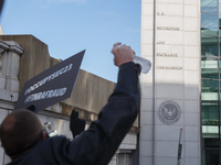 People protest at the U.S. Securities and Exchange Commission headquarters in Washington, D.C. on January 27, 2023, to demand change related...