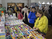 People visit the Cairo International Book Fair at Egypt's International Exhibition Center in Cairo, Egypt, 26 January 2023. Some 51 countrie...