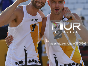 Anders Berntsen Mol (L) and Christian Sandlie Sorum (R) of Norway react during the men's Volleyball World Beach Pro Tour Finals against  Ren...