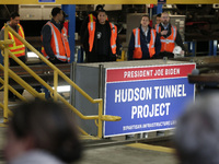 MTA workers await US President Joe Biden discussion about funding for the “Hudson Tunnel Project” at the West Side Rail Yard on January 31,...