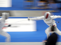Miho Yoshimura, from Japan, and Eloise Vanryssel, from France, during the 46th edition of the City of Barcelona International Fencing Trophy...