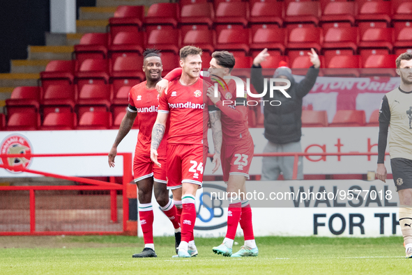 Walsall's Joe Low (24) and teammates celebrate scoring their side's first goal of the game during the Sky Bet League 2 match between Walsall...