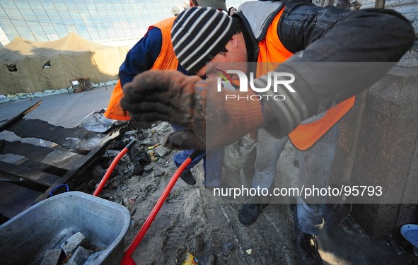 Private workers continue to clean the Square. Some Euromaiden revolutionaries see it as an act of disrespect to those who lost their lives d...