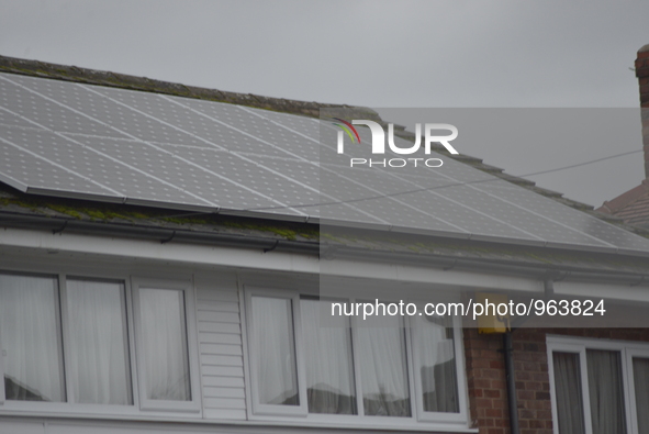 Light shining on solar panels, a form of domestic renewable energy supply, in Stockport, England, on Wednesday 16th December 2015. The panel...