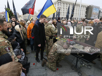 Ukrainians attend a farewell ceremony for Ukrainian soldier Hero of Ukraine Dmytro Kotsiubailo, 27, who died in a battle for Bakhmut, on the...