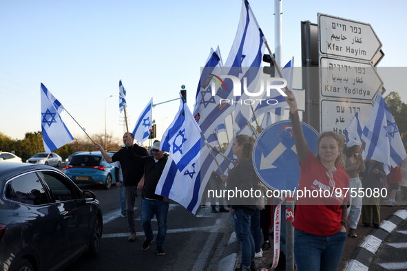 Israeli protesters rally against Israeli Goverment's judicial overhaul bills in the Haogen Junctions on March 16, 2023.  