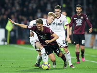 Jerdy Schouten of Bologna FC and Emil Bohinen of US Salernitana compete for the ball during the Serie A match between US Salernitana and Bol...