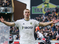Leeds United's Rasmus Kristensen celebrates scoring their side's third goal of the game during the Premier League match between Wolverhampto...