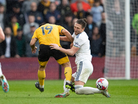 Leeds United's Luke Ayling is fouled by Jonny Castro of Wolves during the Premier League match between Wolverhampton Wanderers and Leeds Uni...