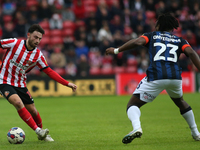 Sunderland's Patrick Roberts takes on Luton Town's Fred Onyedinma during the Sky Bet Championship match between Sunderland and Luton Town at...