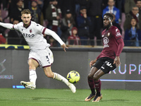 Stefan Posch of Bologna FC  competes for the ball with Boulaye Dia of US Salernitana   during the Serie A match between US Salernitana 1919...