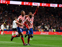 Thomas Lemar and Koke celebrates a goal during La Liga match between Atletico de Madrid and Valencia CF at Civitas Metropolitano on March 18...