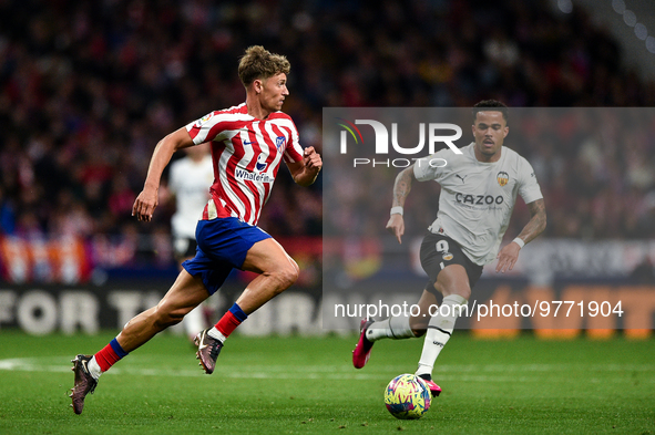 Marcos Llorente and Justin Kluivert during La Liga match between Atletico de Madrid and Valencia CF at Civitas Metropolitano on March 18, 20...