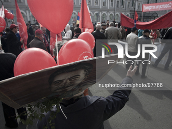 Russian leftists parade during May Day celebrations in Saint Petersburg, Russia, on May 1, 2014. (