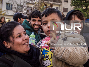 As the New Year approaches in to 2016, thousands of refugees continue to flood in to Greece, on December 30, 2015. When they reach Athens, m...