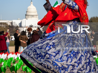 Mina Yousefi, of the Washington, DC area, a celebrates Nowruz on the National Mall. The holiday has its roots in Zoroastrianism and celebrat...