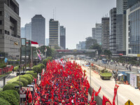 the mayday rally to indonesia state palace. As part of the May Day 2014 celebrations, 120,000 workers in Jakarta and the region, along with...