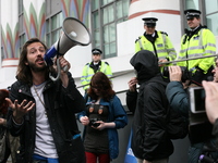  Occupy London organize a splinter march from the main May Day parade in London to protest against pay-day loan company, Wonga, in London, U...