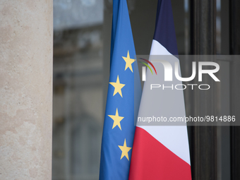 The French and European flags at the entrance to the Elysee Palace, in Paris, on March 27, 2023. (