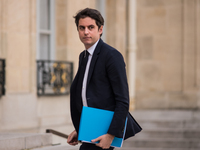Deputy Economy Minister Gabriel Attal arrives at the Elysee Palace for a working lunch, in Paris, on 27 March 2023. (