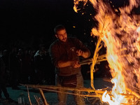 The residents of Argyroupoli village in Rethymno, Greece, in order to honour the dead Jesus but also to illuminate the route followed by the...