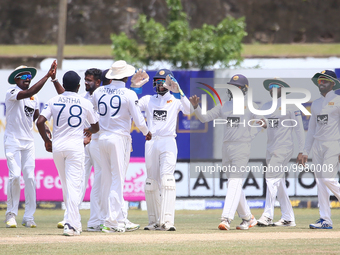 Players of Sri Lanka celebrate after taking the wicket of Andrew Balbirnie of Ireland during the fifth and final day of the second Test matc...