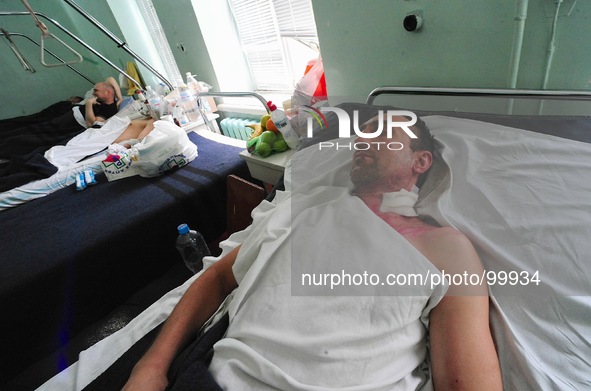 Victims of the Trade Union building fire recover in one of the burn unit wards at Yevreyskaya hospital. More then 30 people were killed afte...