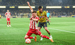 3 MILAD MOHAMMADI of AEK FC competing with 45 OLEG REABCIUK of Olympiacos FC during the Gr...