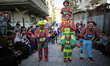 Palestinian clowns perform for children, in the Jabalia refugee camp in the northern of Ga...