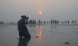 Indian Hindu devotees praying at the Gangasagar Island around 160 km south of Kolkata, Ind...