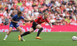 Leah Galton of Manchester United Women holds of Chelsea Women Eve Perissetduring Vitality...