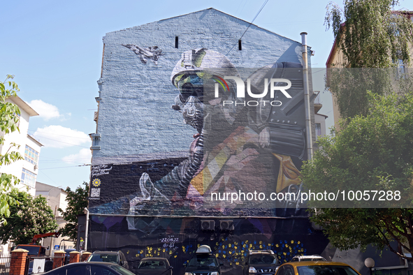 KYIV, UKRAINE - MAY 18, 2023 - The Ghost of Kyiv mural at 3/7 Mezhyhirska Street celebrates the pilots of the 40th tactical aviation brigade...