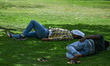 A man takes rest beneath a tree in New Delhi, India on May 22, 2023. India is witnessing h...