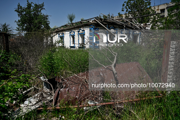 ZAPORIZHZHIA REGION, UKRAINE - MAY 18, 2023 - A collapsed fragment of the fence is seen as a result of shelling of the frontline Hulyaipole...