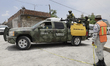 Army security checkpoint in San Nicolas de Los Ranchos, Puebla, after ash fall was registe...