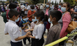 Inhabitants of San Nicolas de Los Ranchos, Puebla, gather after ash fall was registered du...