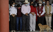 Un perro llama la atencion en San Nicolas de Los Ranchos, Puebla, Mexico, tras reunion ent...