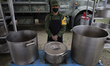 View of a mobile kitchen installed by the Mexican army in a shelter set up in Cholula, Pue...
