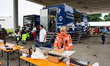 Volunteers at work at the Emergency hub to manage the collection and distribution of essen...