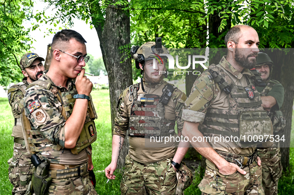 ZAPORIZHZHIA REGION, UKRAINE - MAY 28, 2023 - Servicemen of the 128th Mountain Assault Brigade who took part in the 30th Chestnut Run are pi...