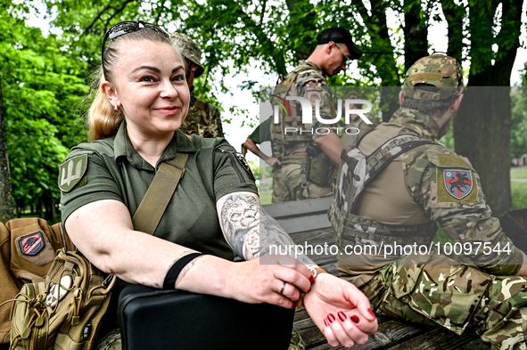 ZAPORIZHZHIA REGION, UKRAINE - MAY 28, 2023 - A servicewoman of the 128th Mountain Assault Brigade gets ready for the 30th Chestnut Run, Zap...