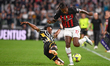 Juan Cuadrado (Juventus), Rafael Leao (AC Milan) during the Serie A Football match between...