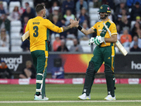 Alex Hales and Shaheen Afridi both of Notts Outlaws celebrate victory during the Vitality T20 Blast match between Durham and Notts Outlaws a...