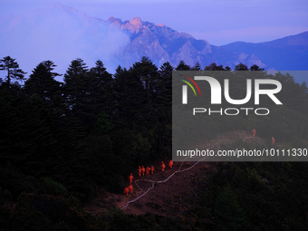 MULI, CHINA - MAY 30, 2023 - Firefighters on the road at Muli Fire site in Muli County, Liangshan, Sichuan province, China, May 30, 2023. At...