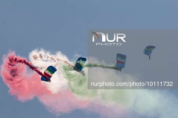  Italian paratroopers  aerobatic demonstration team, the  leaves multi-colored vapor trails as they fly over Rome on the occasion of the 77t...