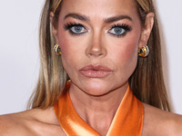 American actress, television personality and former fashion model Denise Richards arrives at the 30th Annual Race To Erase MS Gala held at t...