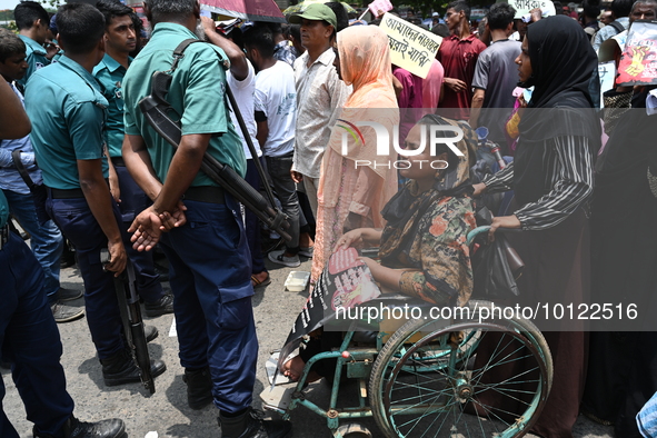 Disabled people protest demanding to raise their government allowance, in Dhaka, Bangladesh, on June 4, 2023.

 